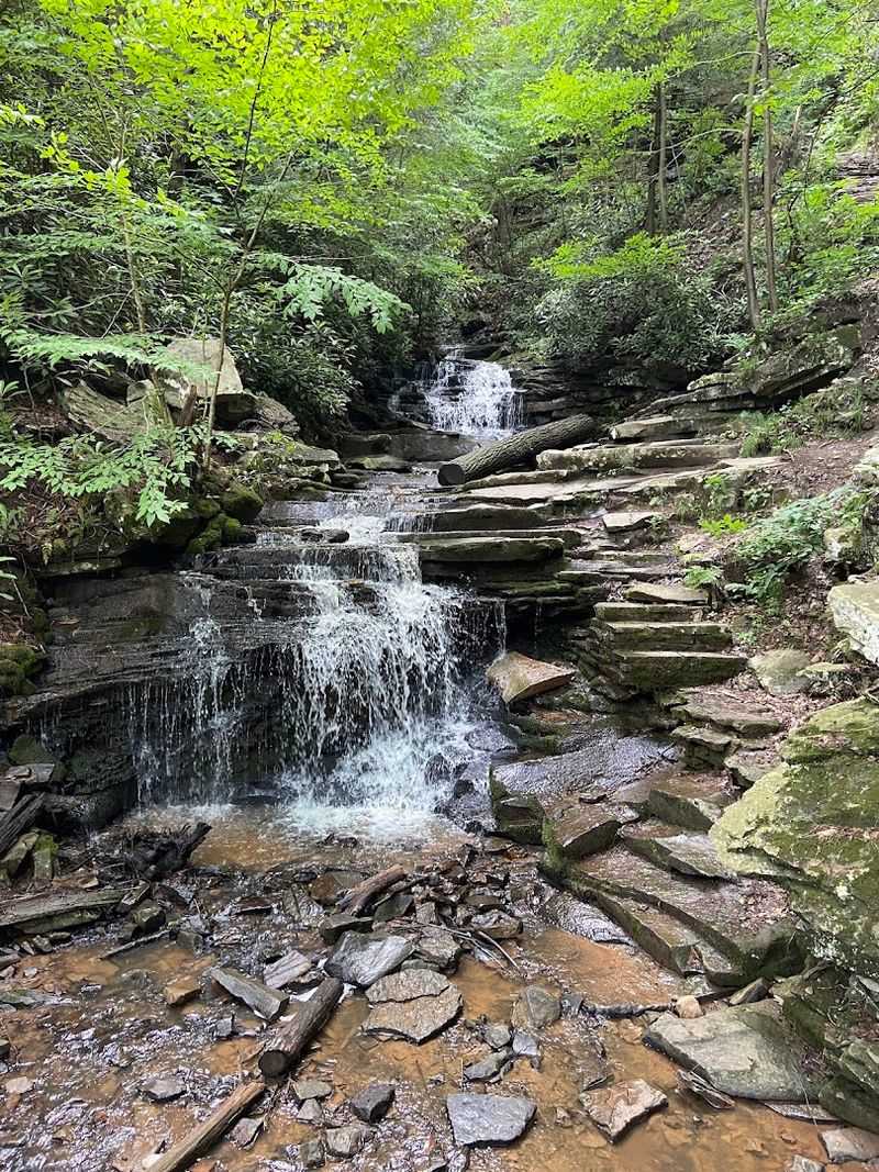 The Waterfall And Creek Make The Setting Better The Waterfall And Creek Make The Setting Better