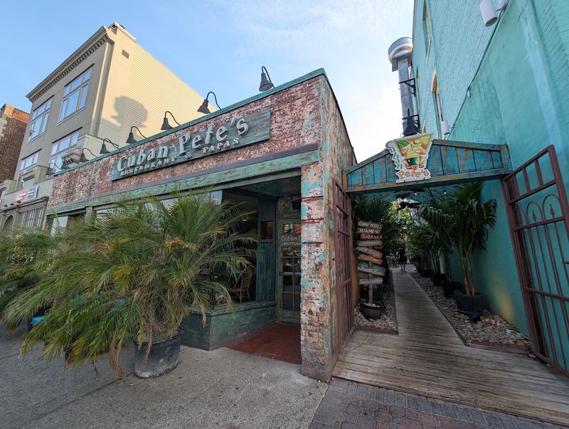 The Weathered Turquoise Entrance That Sets the Island Mood