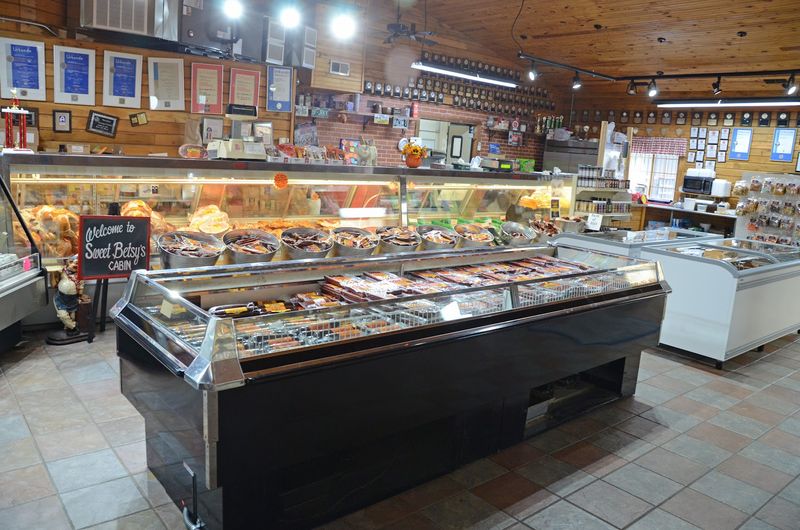 The bacon and smoked meat case is the headline attraction