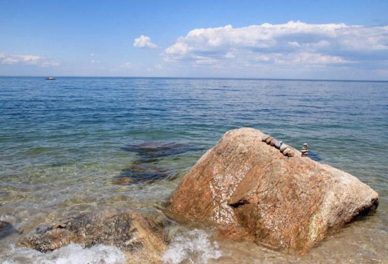 The glacial rocks give the beach a character all its own The glacial rocks give the beach a character all its own