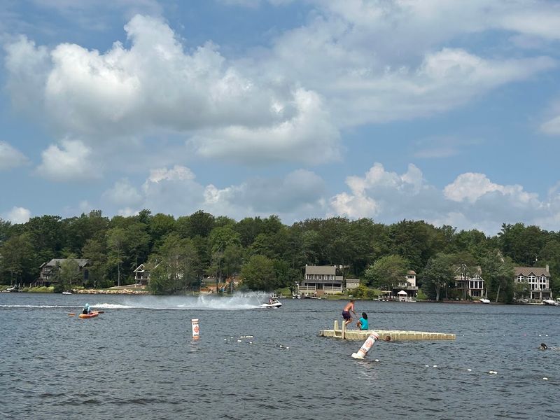 The lake itself feels louder and busier
