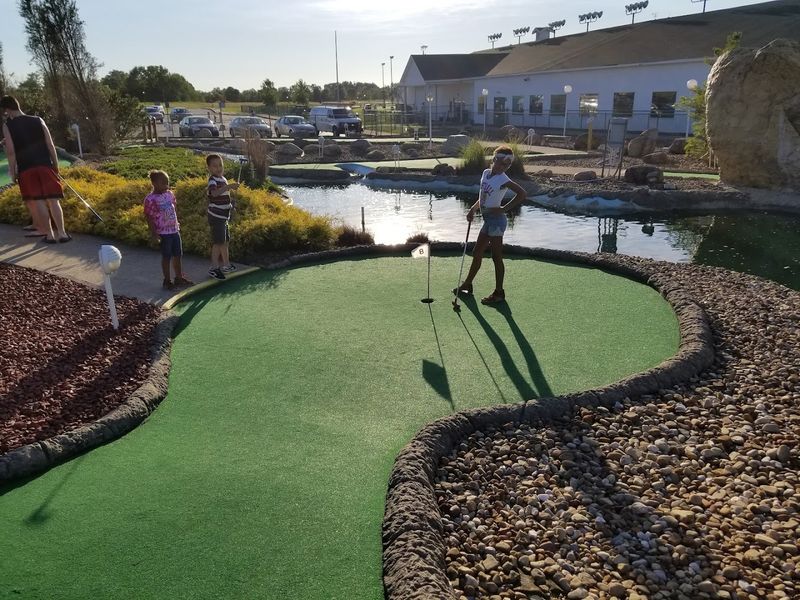 The mini golf course keeps the night moving