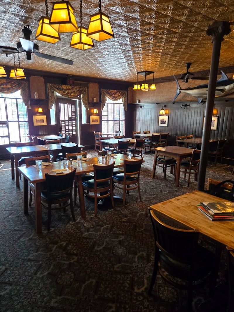 The oak-paneled room sets the tone The oak-paneled room sets the tone