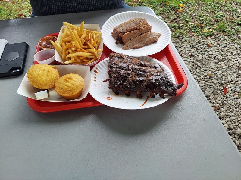 The sides and sauce help complete the meal The sides and sauce help complete the meal