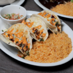 This Cozy Tennessee Mexican Restaurant Serves Enchiladas Smothered In Cheesy Comfort