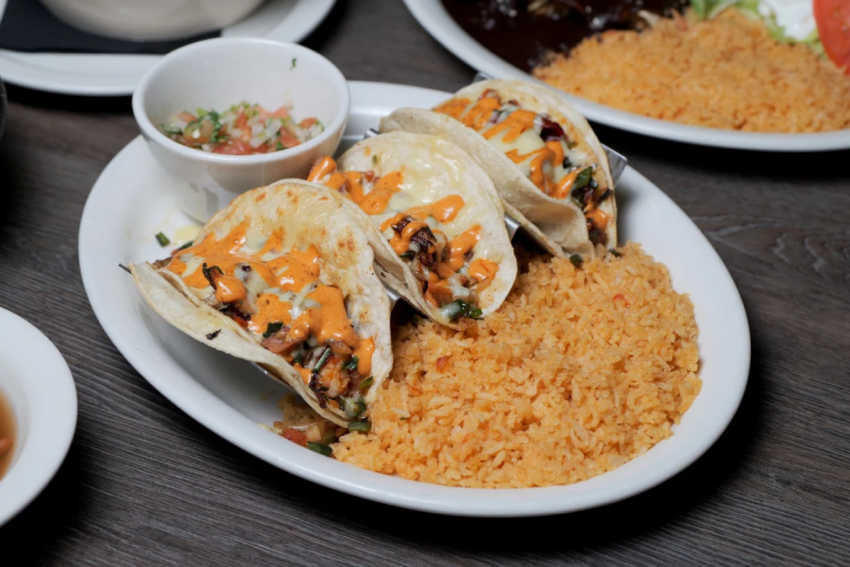 This Cozy Tennessee Mexican Restaurant Serves Enchiladas Smothered In Cheesy Comfort