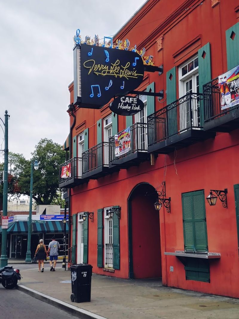 Walk Beale Street after dark in Memphis