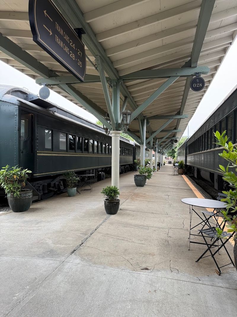 Walk Past Vintage Train Cars, Courtyards, and Photo-Worthy Details Walk Past Vintage Train Cars, Courtyards, and Photo-Worthy Details