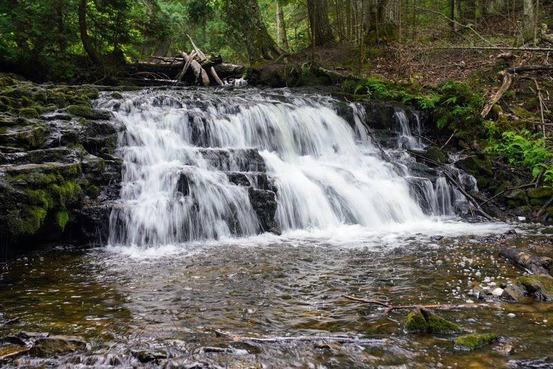 Why This Waterfall Holds Its Own in the Upper Peninsula Why This Waterfall Holds Its Own in the Upper Peninsula