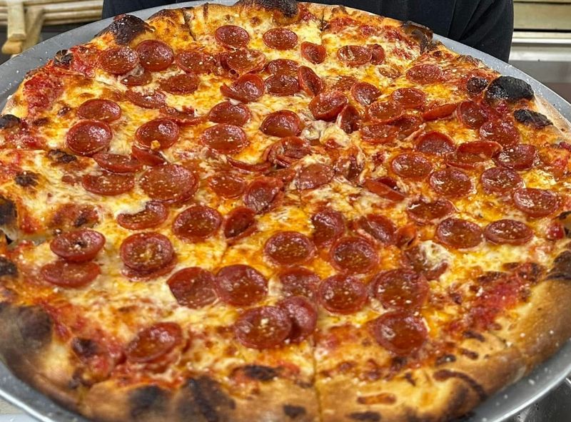 Why the Crust and Sauce Hold Up Under All That Cheese Why the Crust and Sauce Hold Up Under All That Cheese