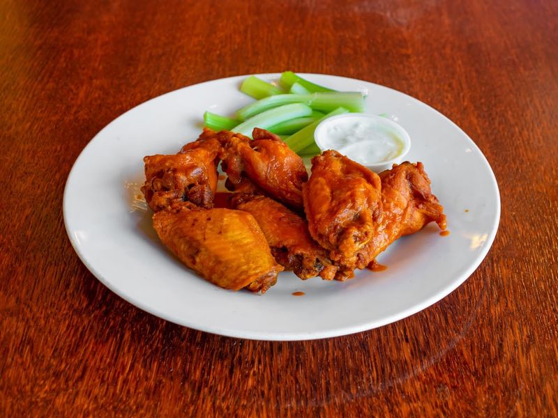 Wings, Burgers, and Disco Fries Keep the Comfort Food Coming Wings, Burgers, and Disco Fries Keep the Comfort Food Coming