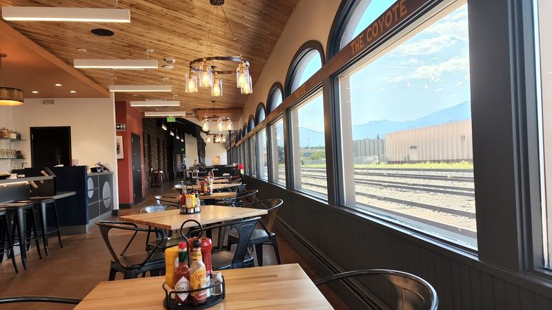 Colorado Springs, With Trains Rolling Past the Windows
