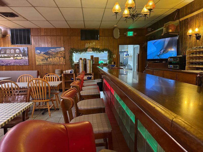 Wood Paneling, Checkered Tables, And Zero Pretending