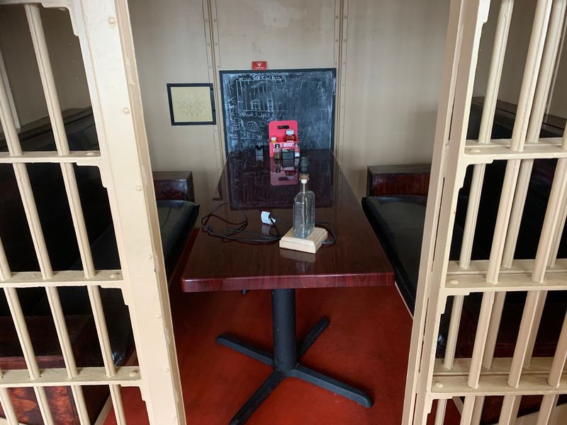 A Table Behind Bars Changes the Whole Meal