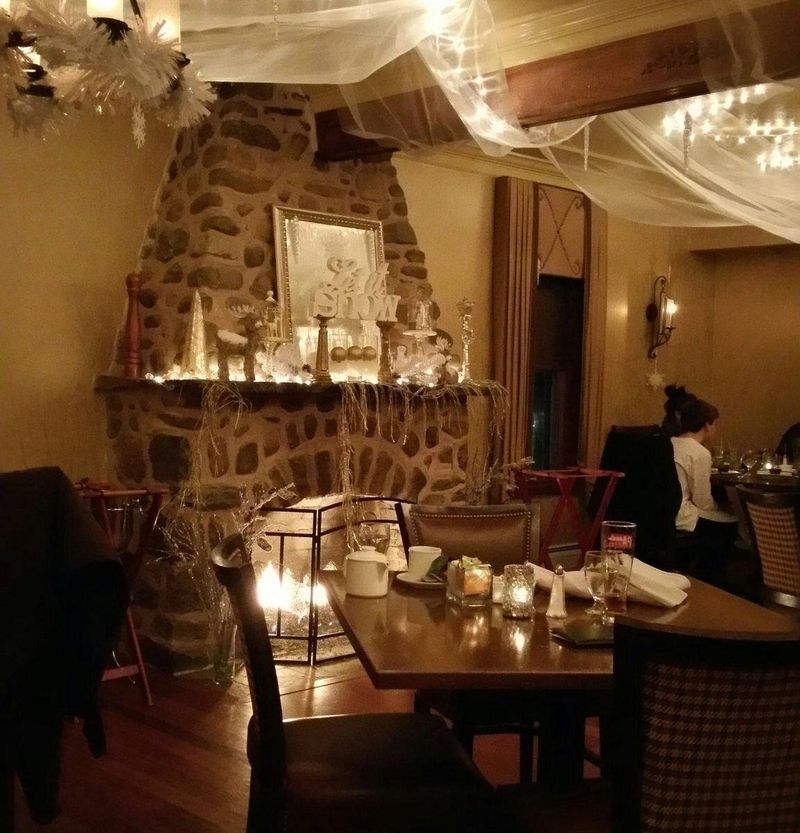 A Cozy Room With a Stone Fireplace Feel