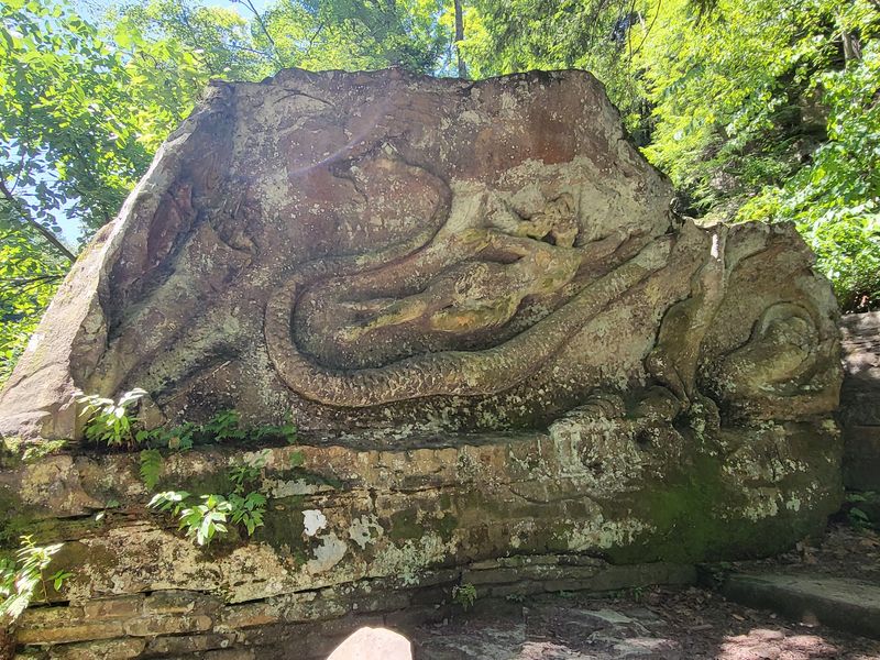 A Riverside Rock With a Story Cut Into Stone A Riverside Rock With a Story Cut Into Stone