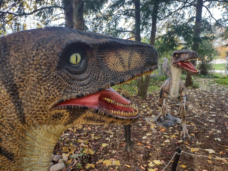 A campus corner where dinosaurs suddenly appear