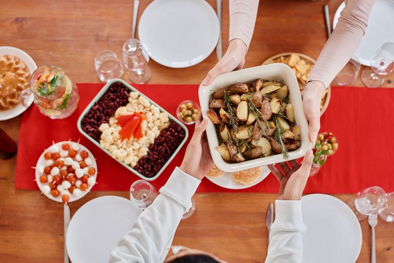 Ask For Food To Be Passed Instead Of Reaching Across The Table