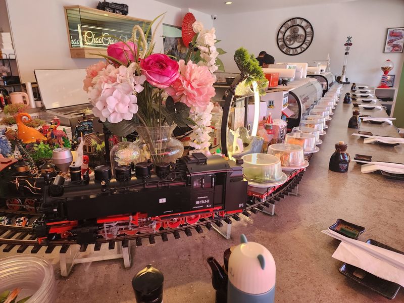 Colorful Train-Themed Décor Turns the Dining Room Into a Miniature Village Colorful Train-Themed Décor Turns the Dining Room Into a Miniature Village