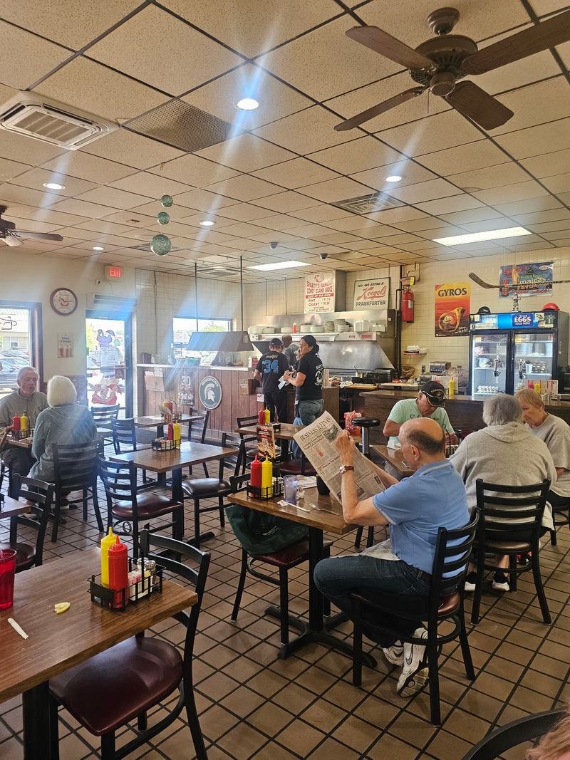 Counter Seats, Bright Lights, and a Room That Moves