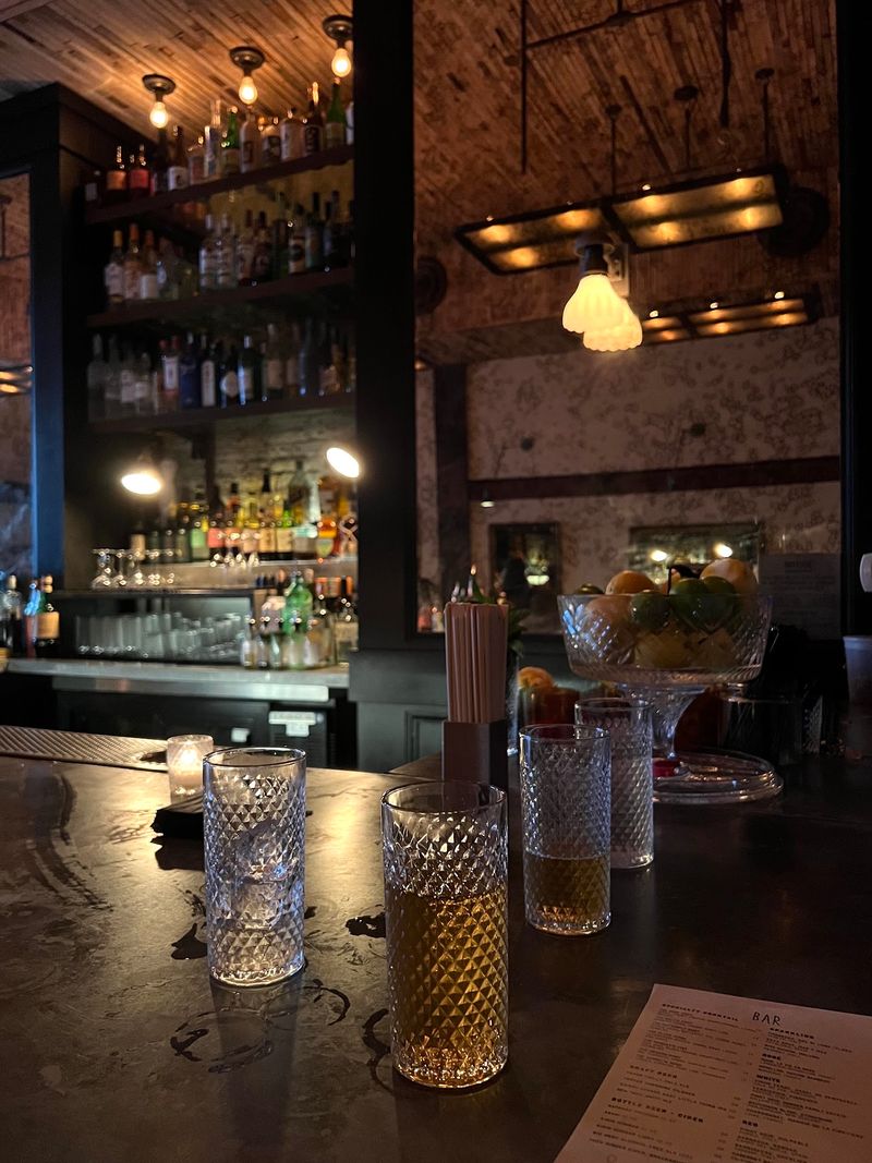Dim Lighting Gives the Restaurant Its Secretive Charm Dim Lighting Gives the Restaurant Its Secretive Charm