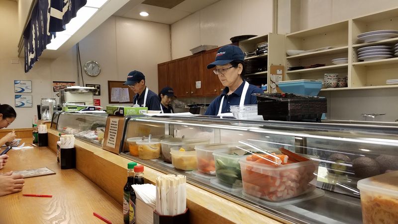 Fresh Sushi Moves Fast at the Back Counter Fresh Sushi Moves Fast at the Back Counter