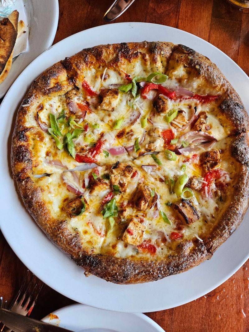Hand-Shaped Pizza Wins Over Hungry Travelers Hand-Shaped Pizza Wins Over Hungry Travelers