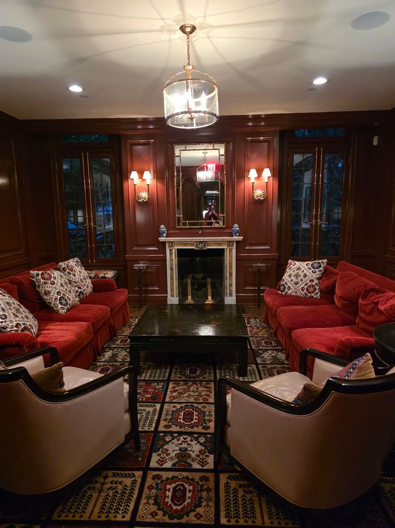 Shelves, Fireplaces, And A Room That Invites You To Stay