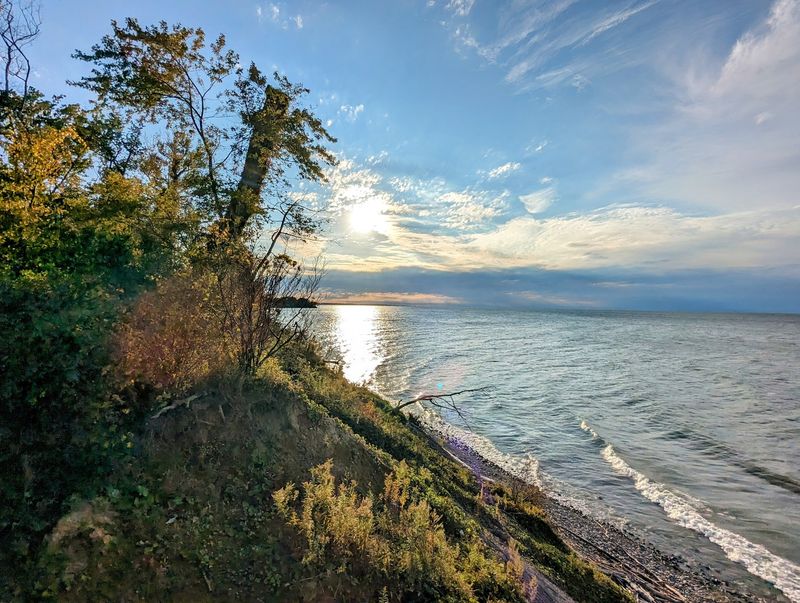 Stroll the blufftop trails while the evening light changes