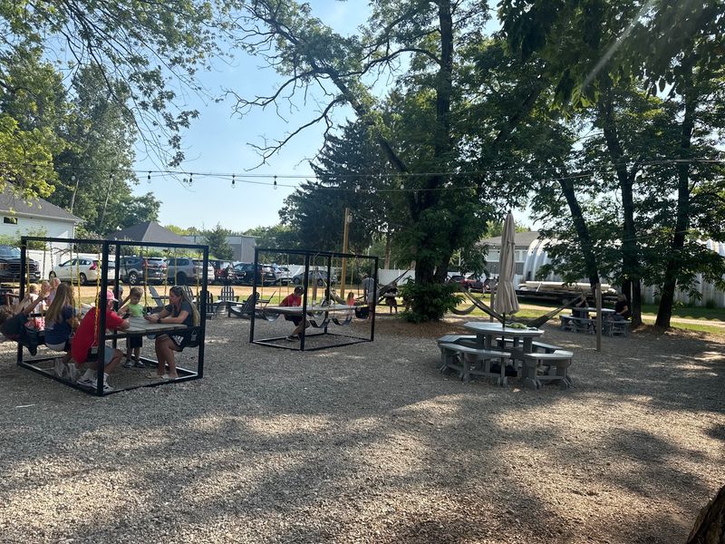 Swing Tables That Turn a Quick Stop Into Hangout Time Swing Tables That Turn a Quick Stop Into Hangout Time