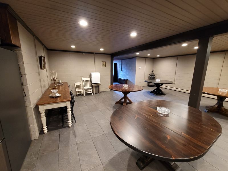 Tables, Chairs, And A Kitchen Make Hosting Easier