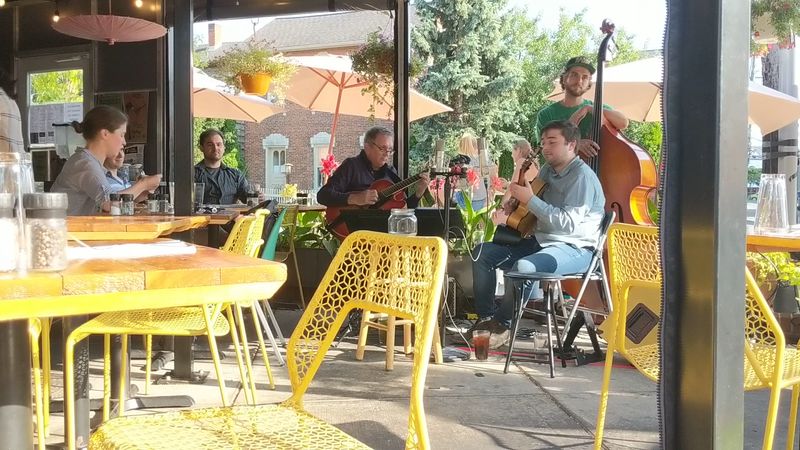 The patio, the music, and the easygoing social rhythm The patio, the music, and the easygoing social rhythm