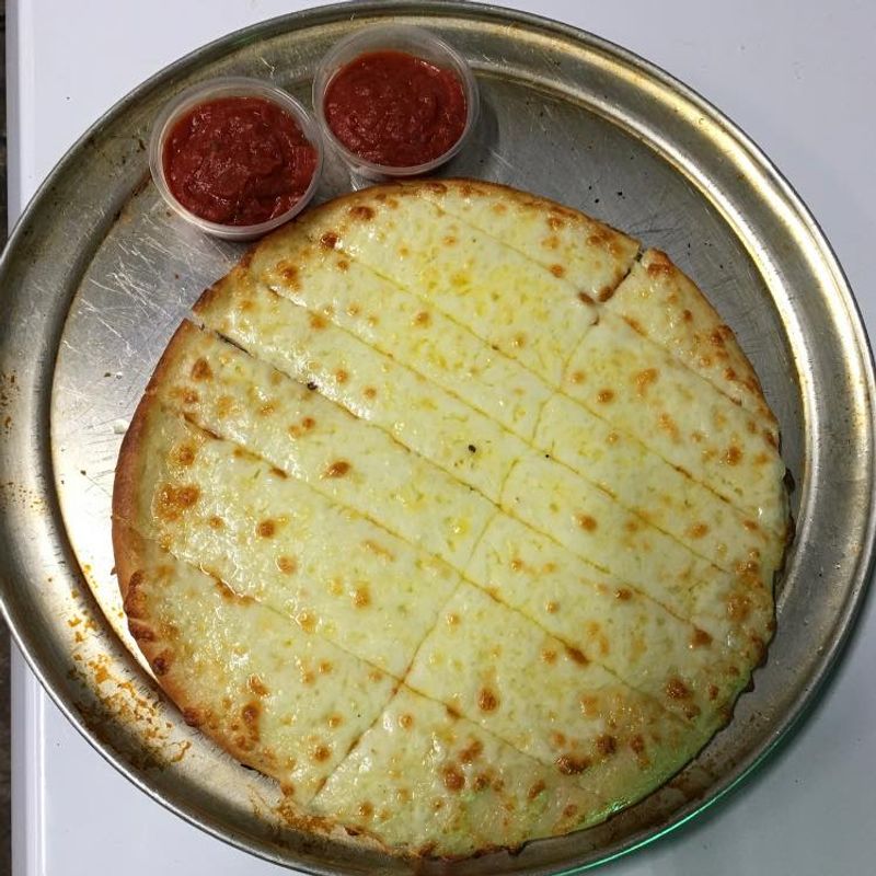 Thin-Crust Pizza That Sparks Debate Thin-Crust Pizza That Sparks Debate