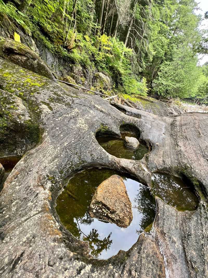 Waterfalls, Potholes, And River-Carved Rock