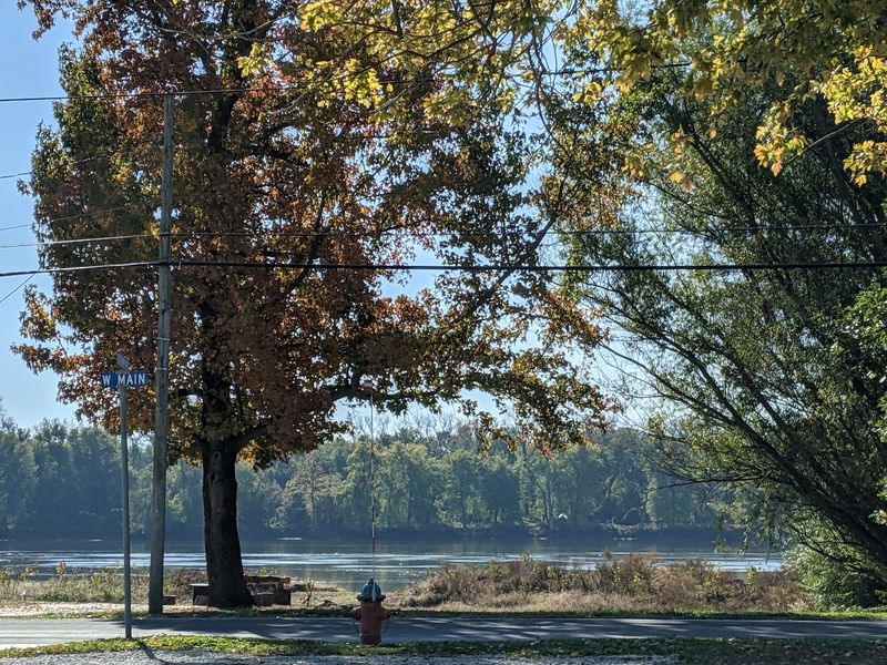 A River Town Backdrop That Sets the Mood