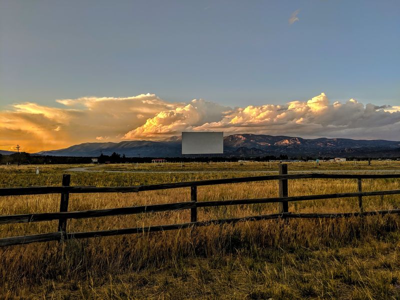 A Giant Screen Framed by Peaks
