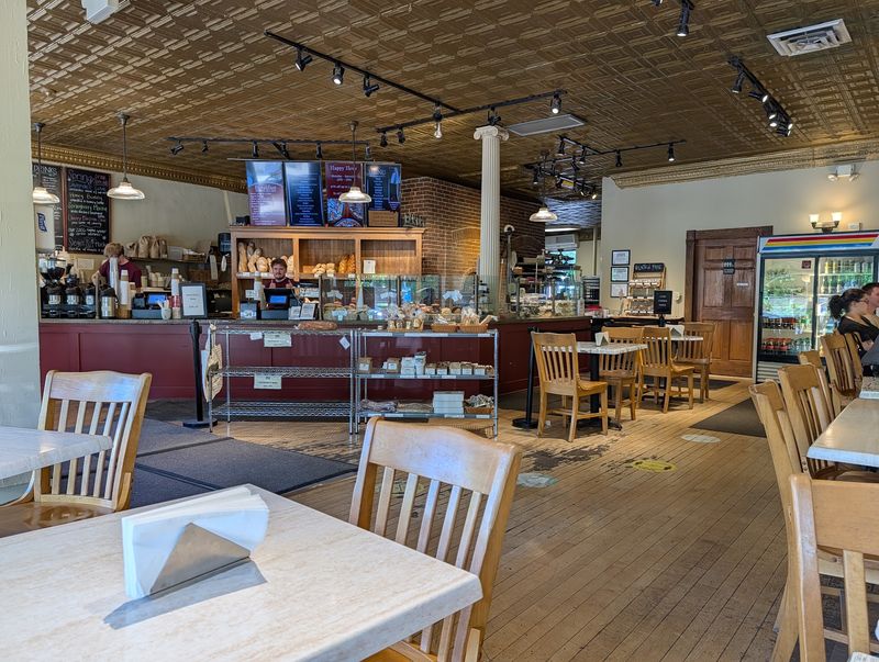 A busy corner where bread and pizza share the spotlight