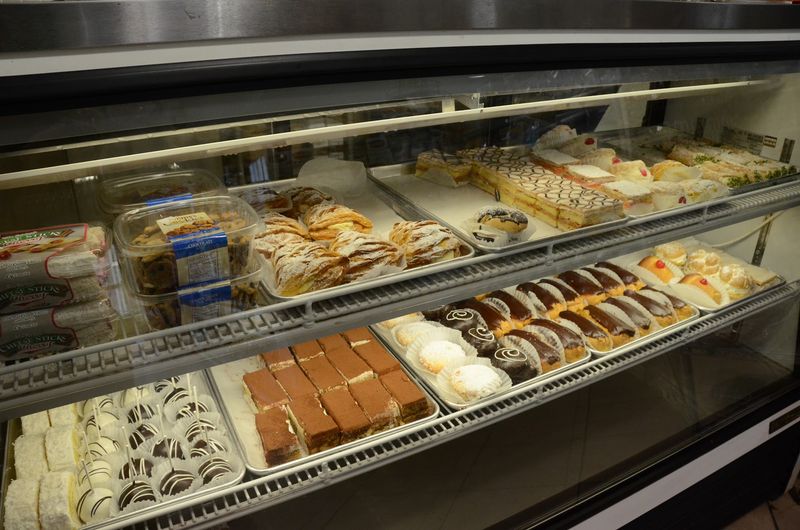 Pastry Cases, Cheeses, and the Extra Temptations Pastry Cases, Cheeses, and the Extra Temptations