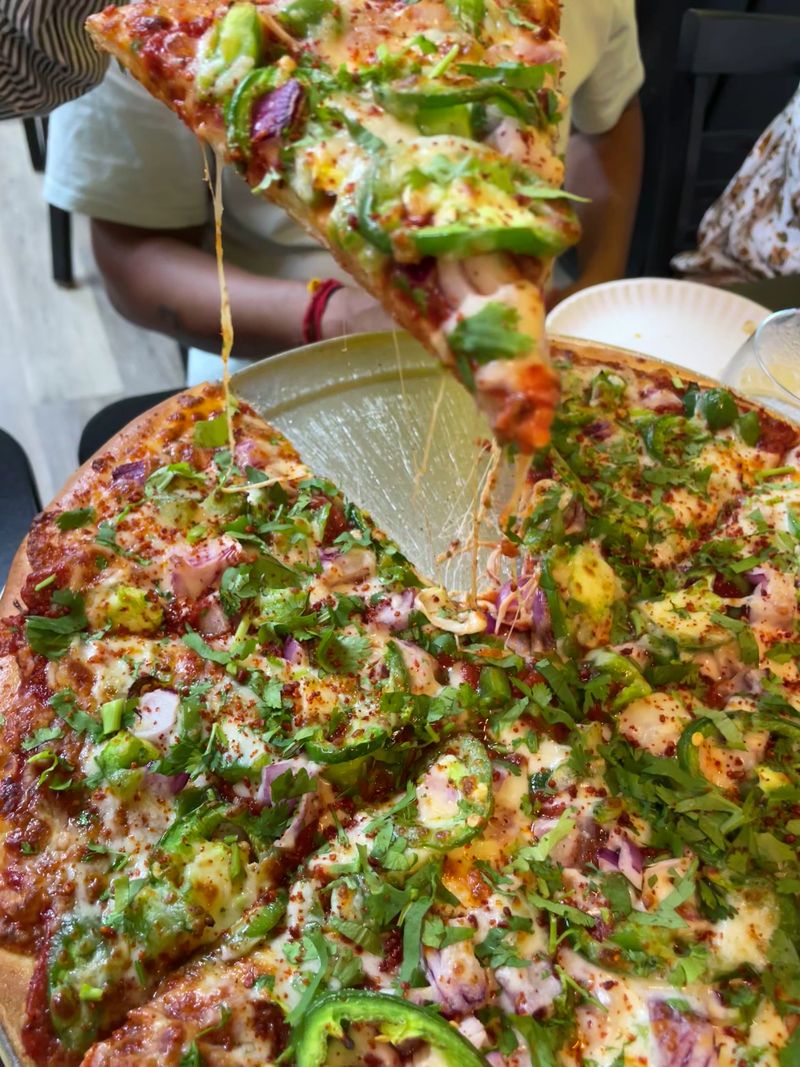 Bombay Veggie and Achari Pizzas Keep the Choices Interesting Bombay Veggie and Achari Pizzas Keep the Choices Interesting