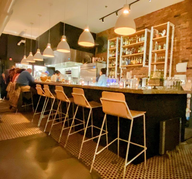 Counter seats turn dinner into a live show