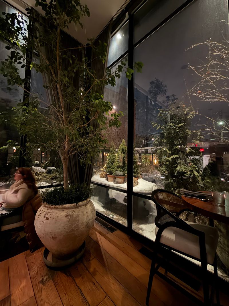 Glass-Enclosed Dining Adds City Magic