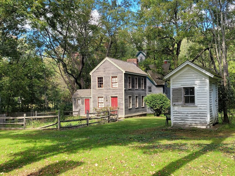 Historic Homes and Workshops Still Line the Empty Road Historic Homes and Workshops Still Line the Empty Road