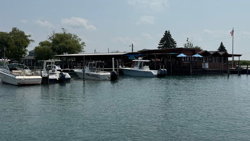 Old-school Harsens Island, Michigan on a plate and a dock Old-school Harsens Island, Michigan on a plate and a dock