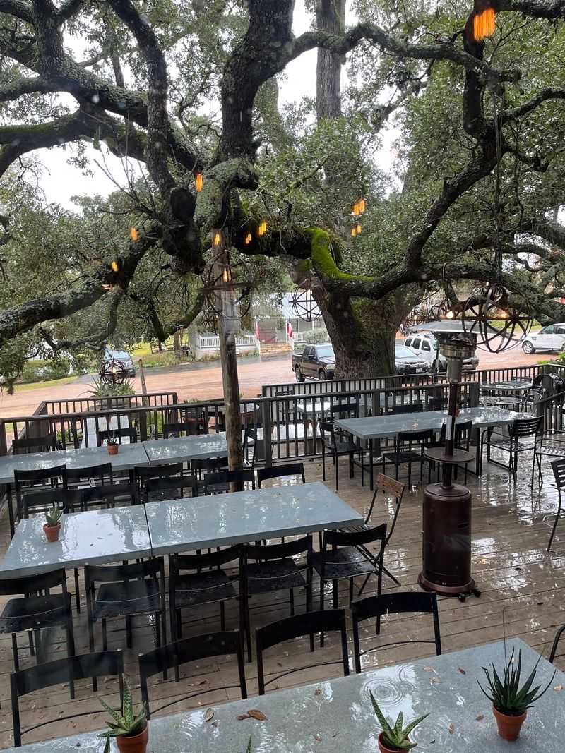 Outdoor Seating Under Century-Old Oaks Outdoor Seating Under Century-Old Oaks