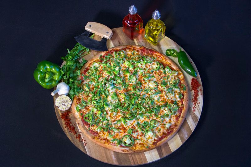 Paneer Tikka Pizza Piles Bold Flavor Onto a Crispy Crust Paneer Tikka Pizza Piles Bold Flavor Onto a Crispy Crust