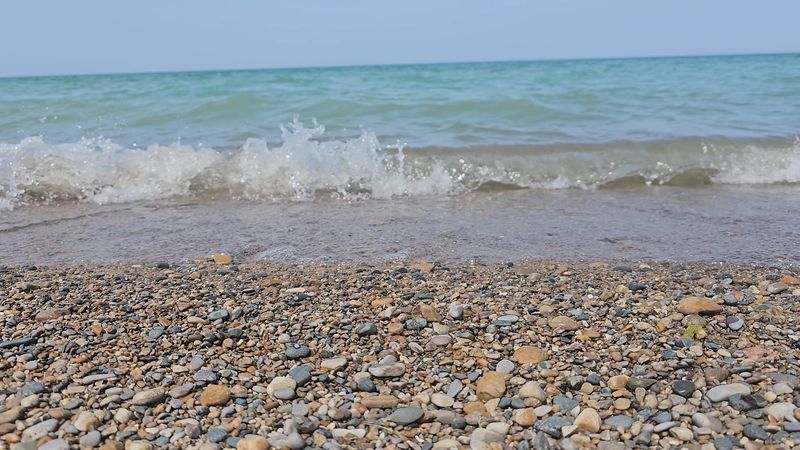 Sand, Stone, and Shallow Water Up Front Sand, Stone, and Shallow Water Up Front