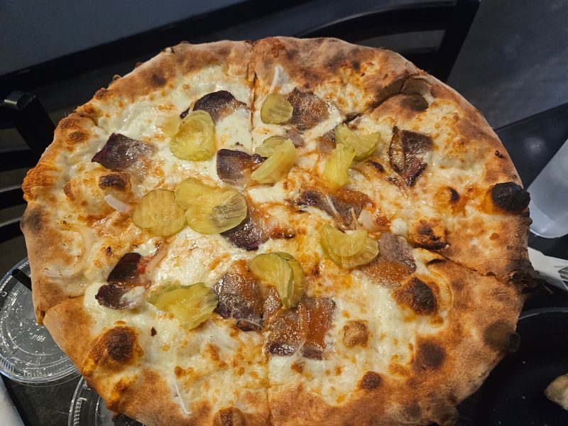 The BBQ Brisket Pizza That Keeps Locals Coming Back The BBQ Brisket Pizza That Keeps Locals Coming Back