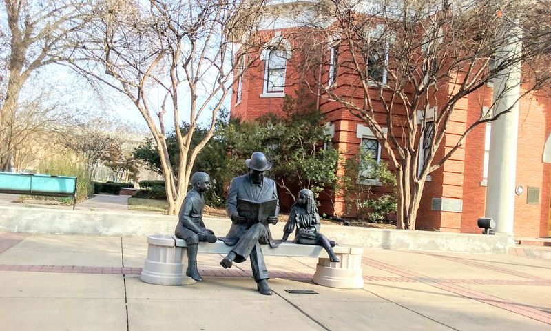 The Reading Gentleman Statue Outside