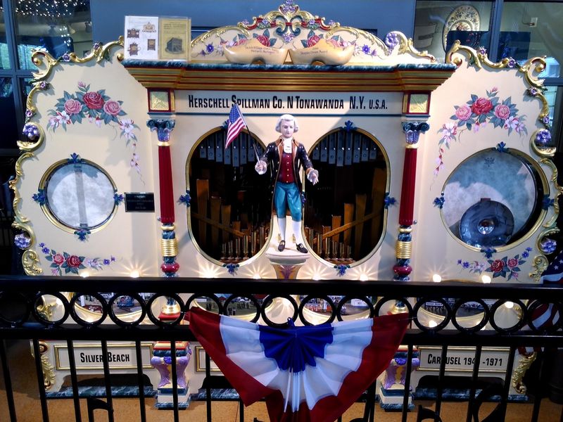 The music hits before the carousel even starts