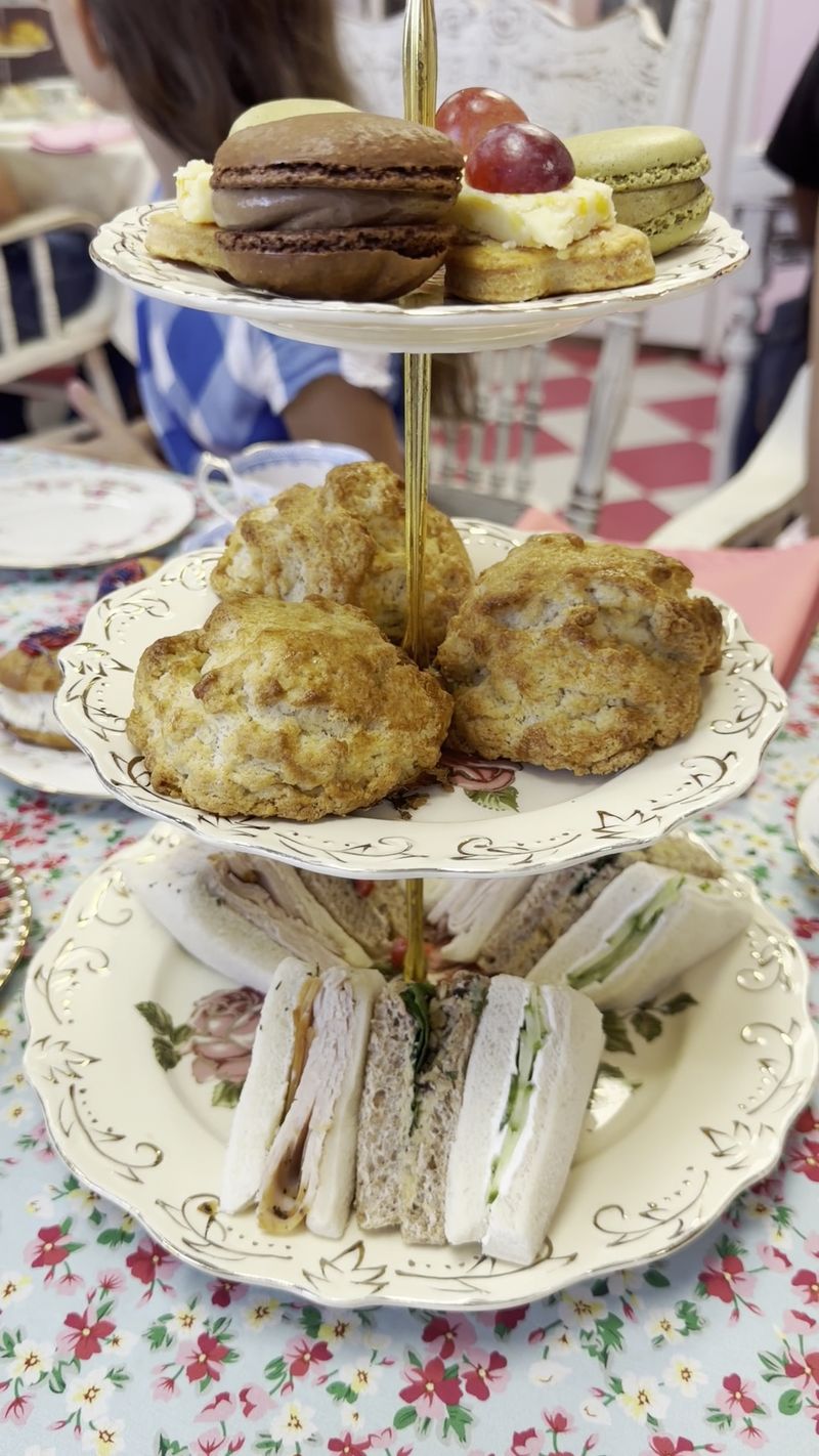 Three-Tiered Stand Loaded with Savory and Sweet Delights Three-Tiered Stand Loaded with Savory and Sweet Delights